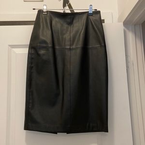 Black vegan leather skirt with slit at the back